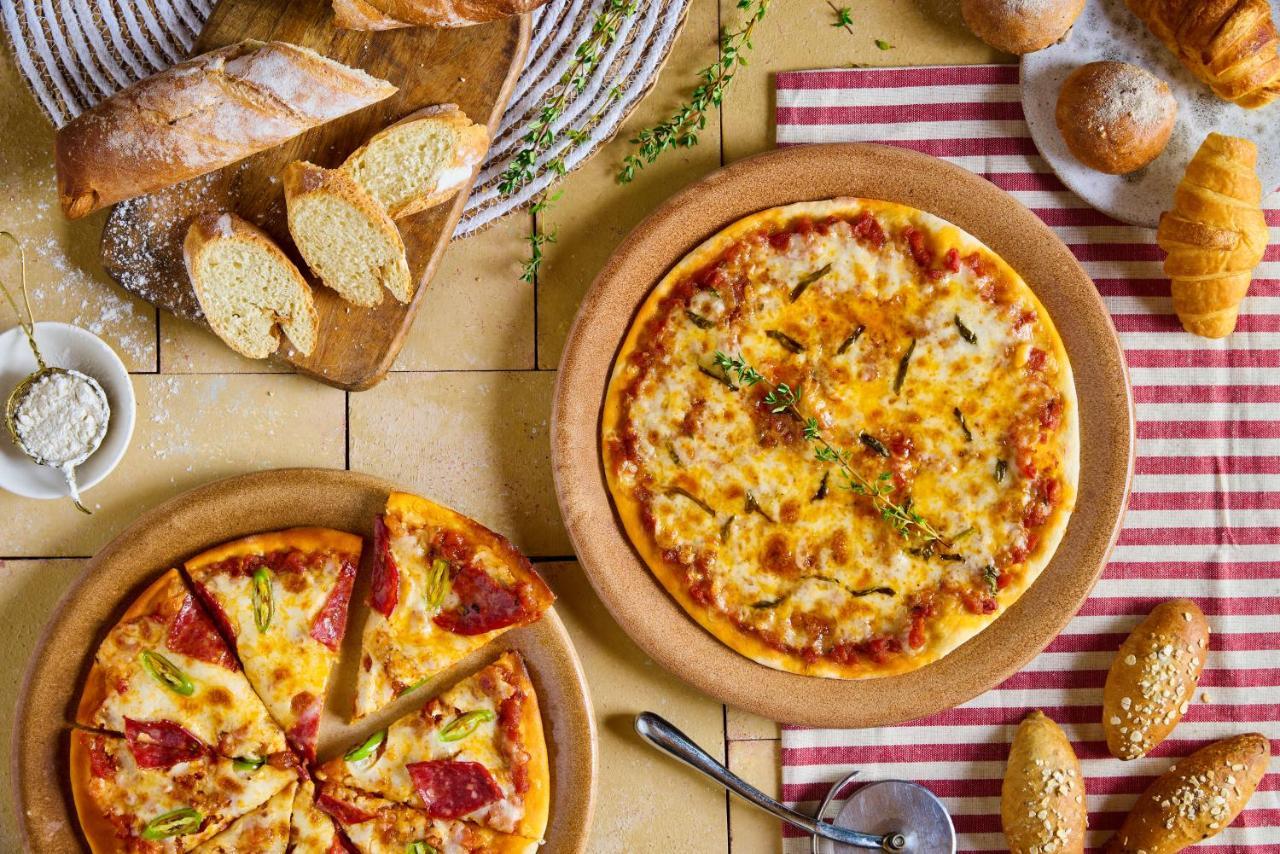 Benben By Dhara Hotels - Adults Only Asszuán Kültér fotó Pizza